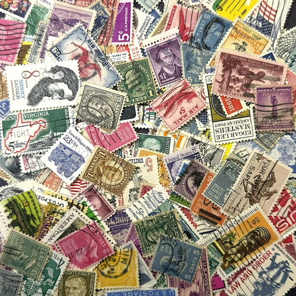 A curated mix of at least 250 stamps